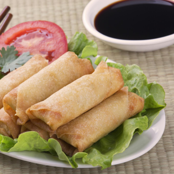 A plate of Spring Roll with Dipping Sauce